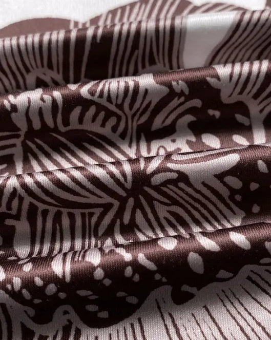 Combi-pantalon à bretelles ajustables avec imprimé floral et design à poches, jambe large
