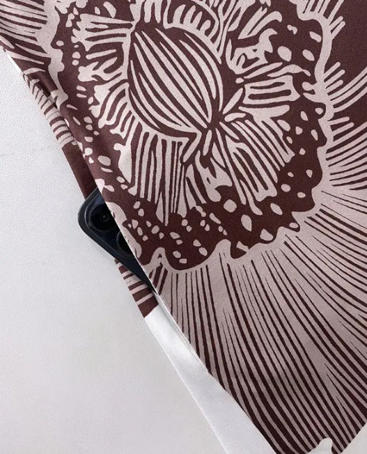 Combi-pantalon à bretelles ajustables avec imprimé floral et design à poches, jambe large