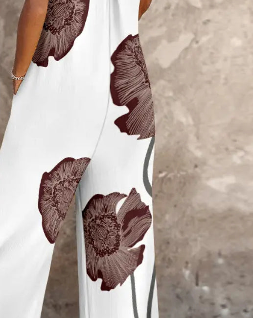 Combi-pantalon à bretelles ajustables avec imprimé floral et design à poches, jambe large