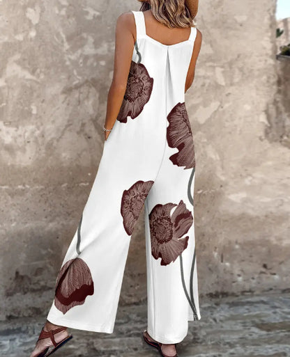 Combi-pantalon à bretelles ajustables avec imprimé floral et design à poches, jambe large